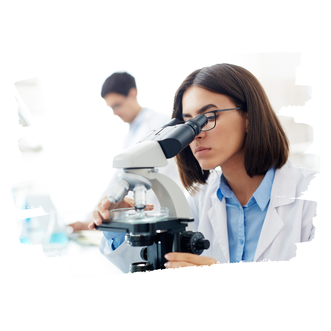 Woman looking with a microscope in a lab